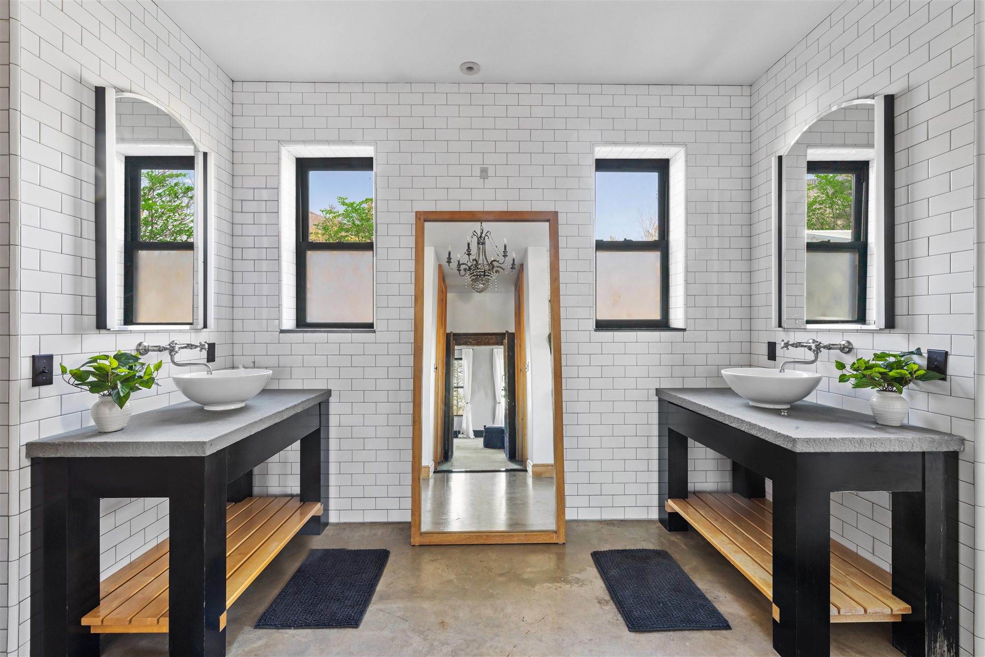 Twin-vanity bath in white subway tile