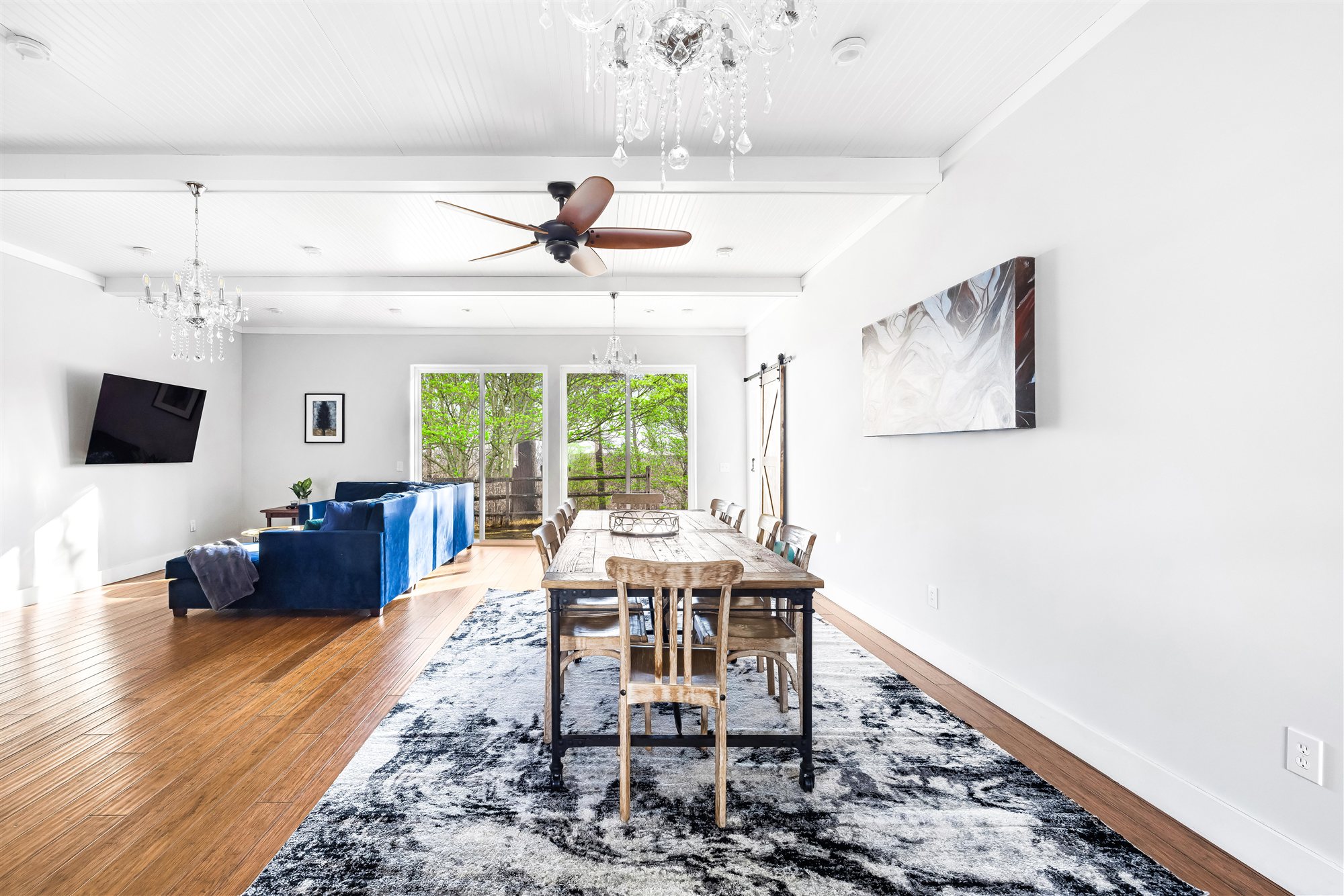 The Center Hall — dining for twelve and TV lounge