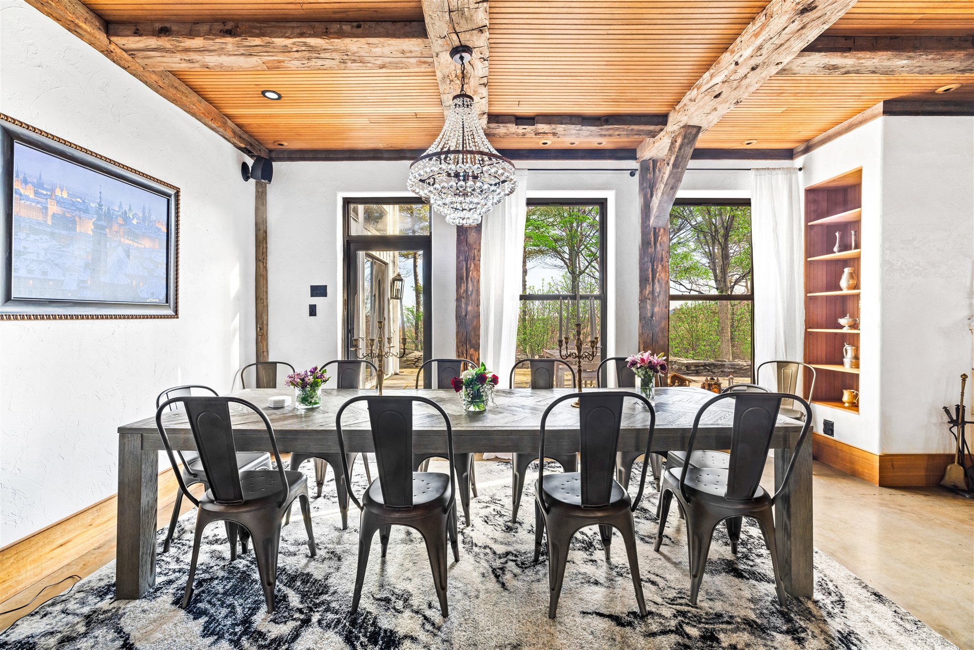 Dining beneath reclaimed timber beams