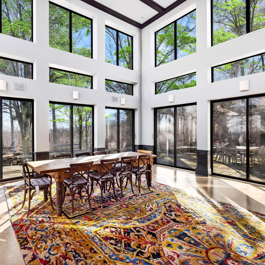 Farmhouse dining table with forest views on three sides