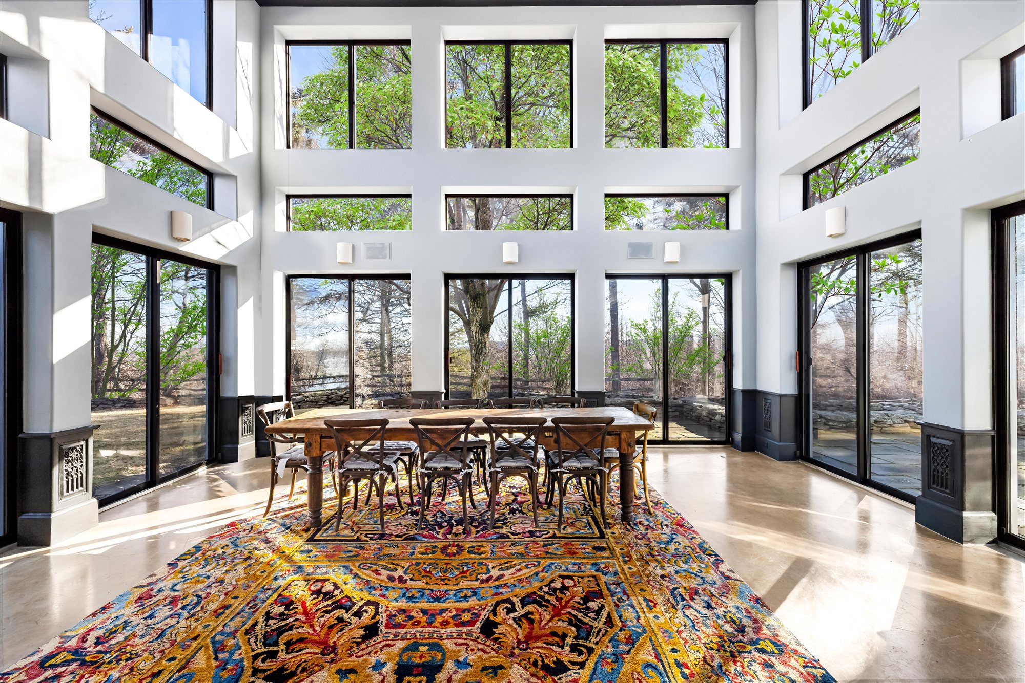The 10-seat farmhouse table, forest on three sides