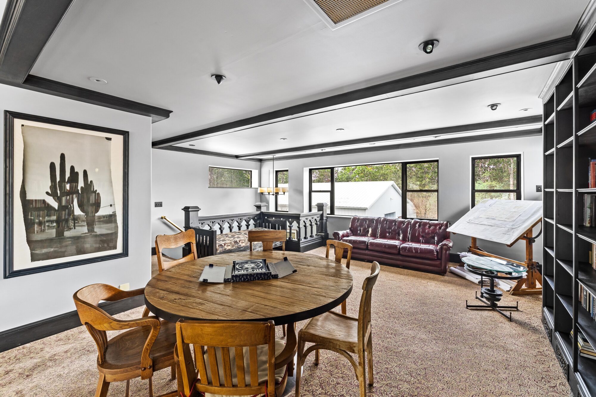 The Study — a library loft above the hall